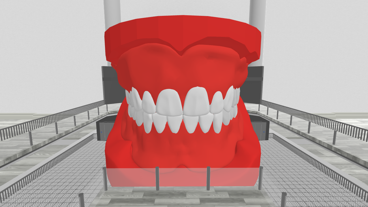 A large 3D model of a set of human teeth displayed in a virtual environment, shown from the front. The model includes detailed white teeth and gums, surrounded by a viewing balcony.
